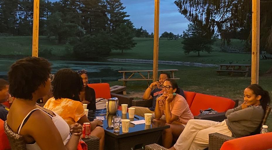 students talk outside